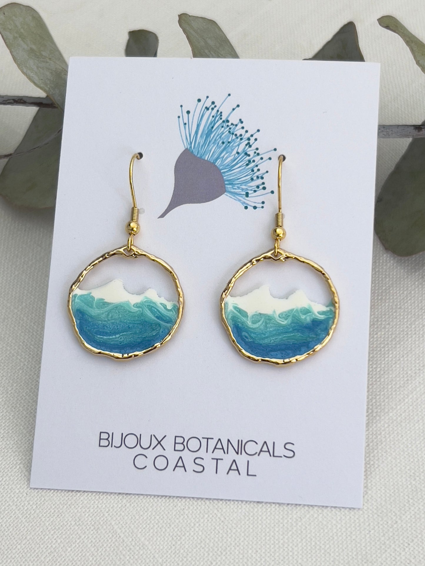 Round gold ocean wave earrings