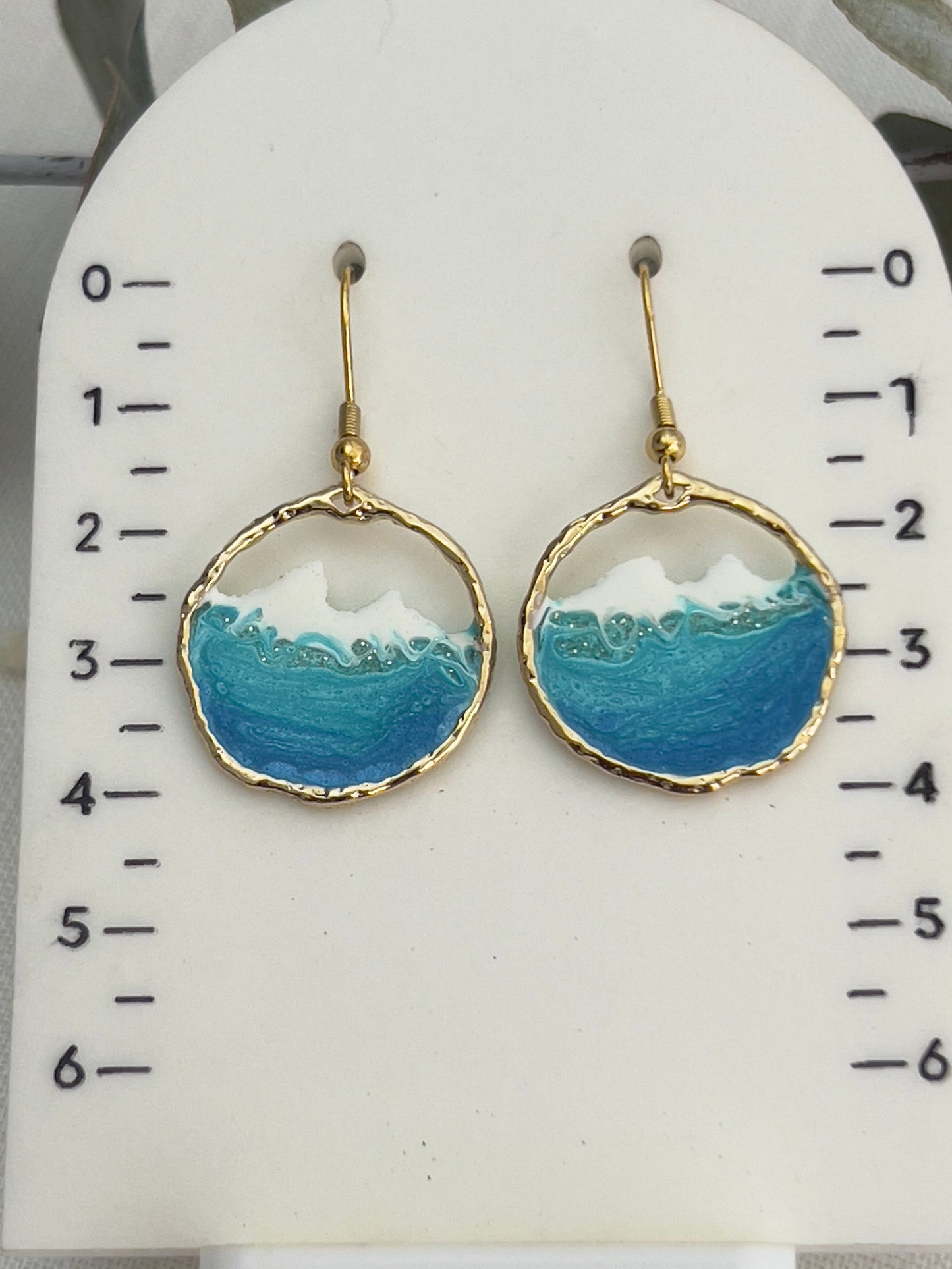 Round gold ocean wave earrings
