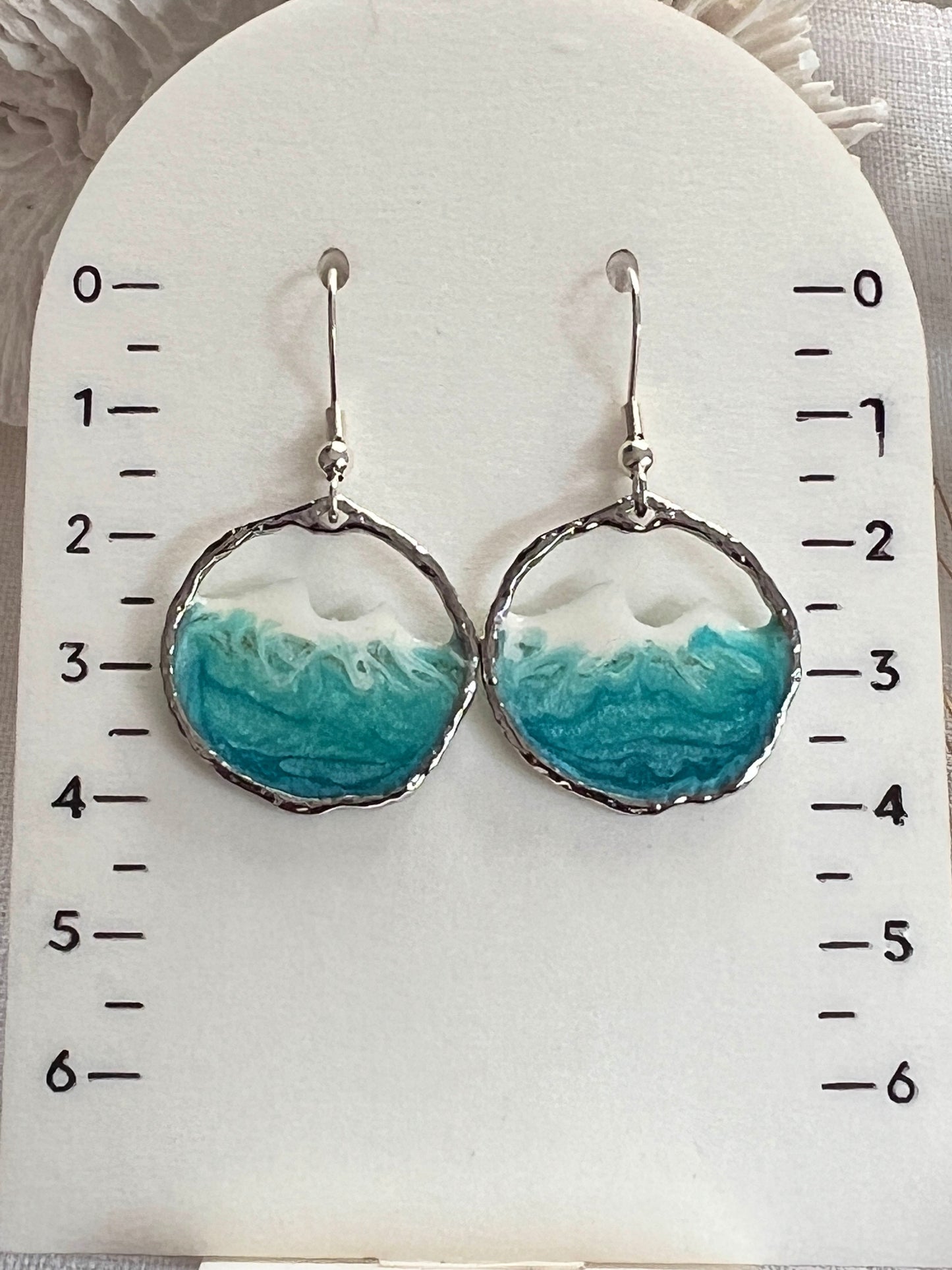 Round silver ocean wave earrings