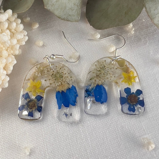 Vibrant blue floral arch earrings