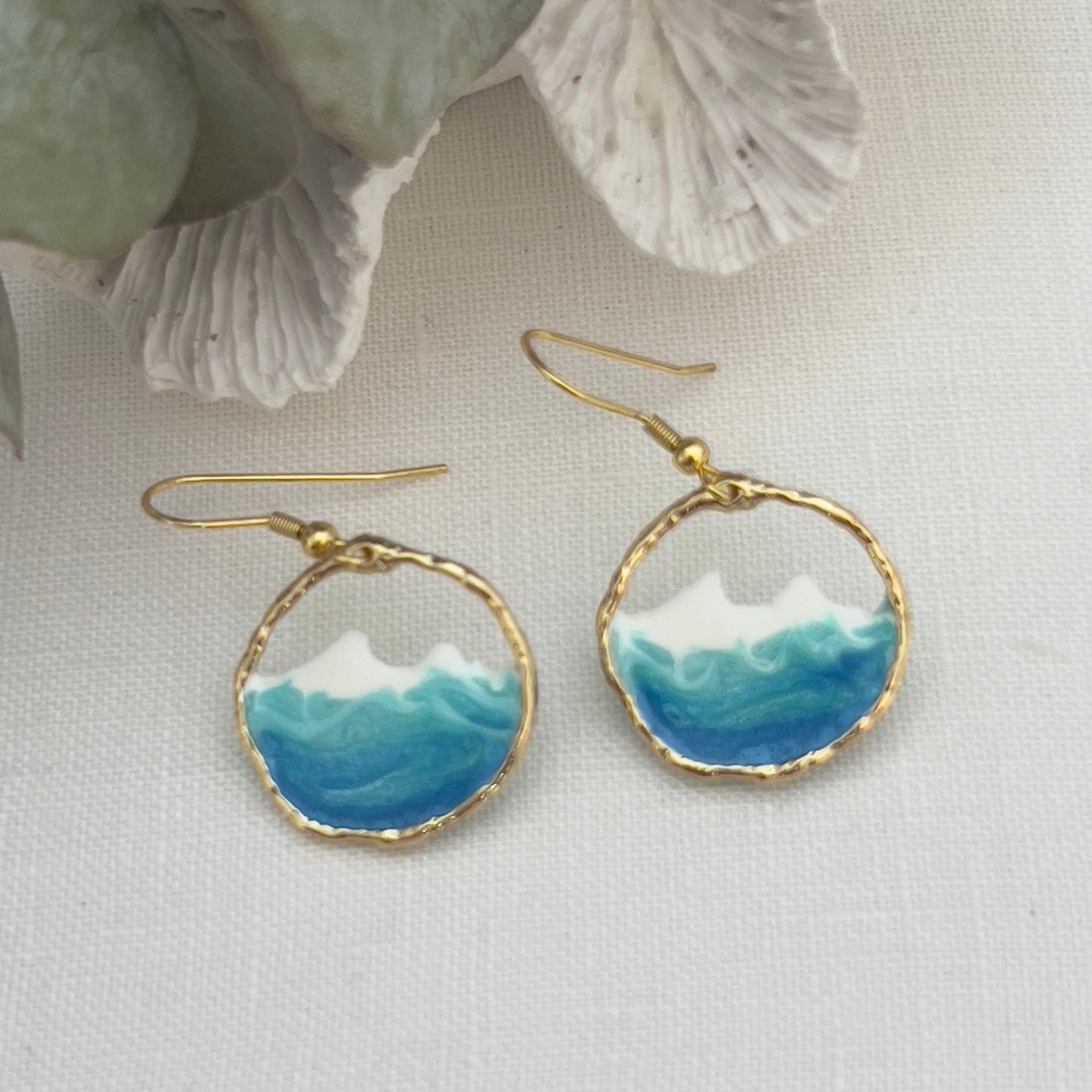Round gold ocean wave earrings