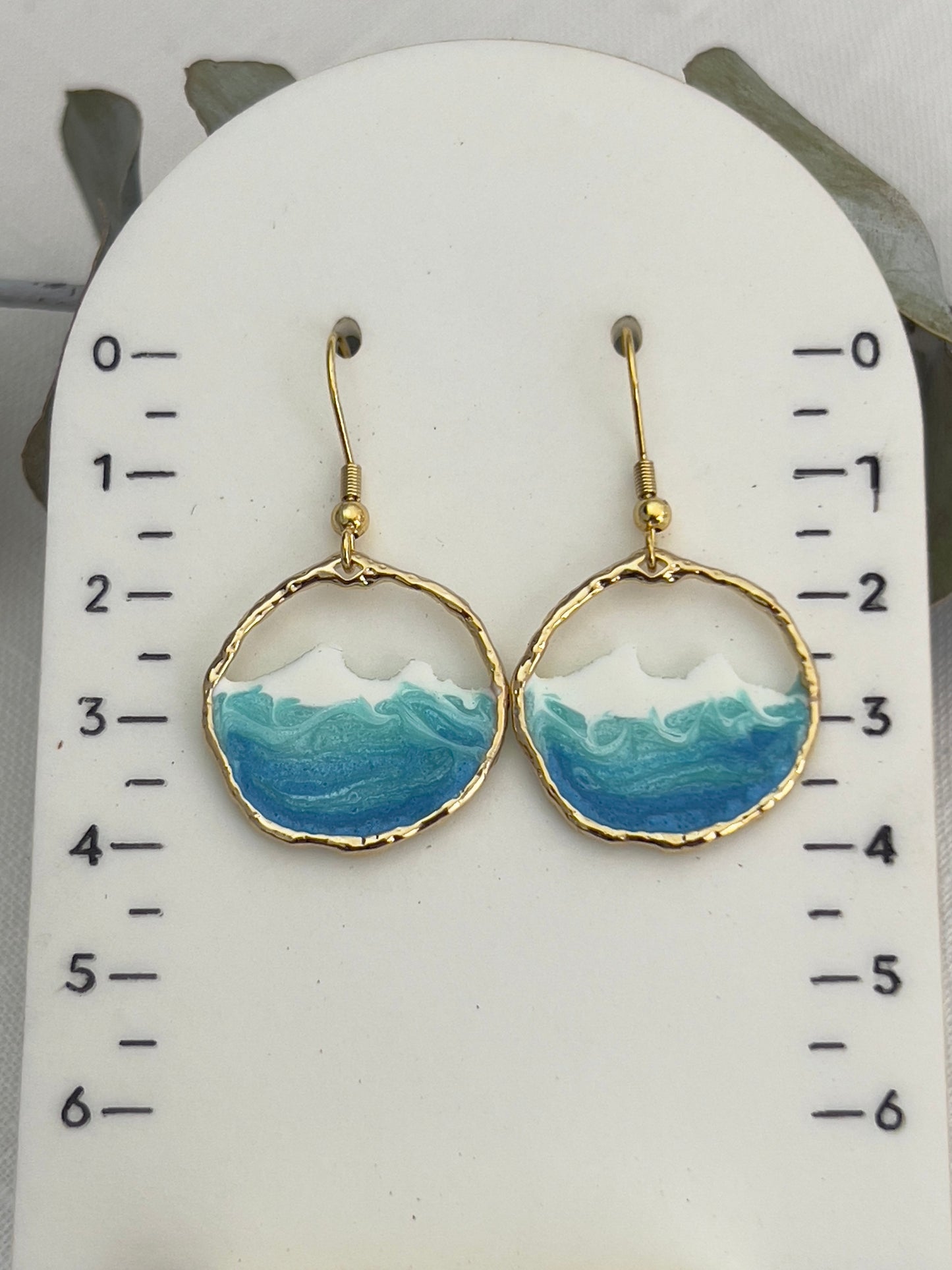 Round gold ocean wave earrings