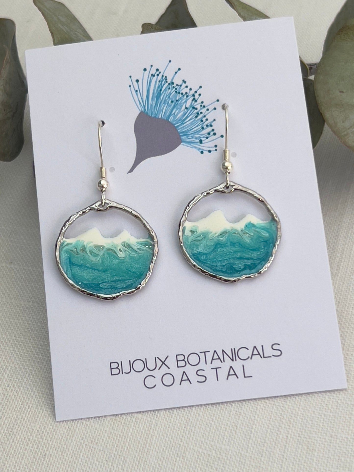Round silver ocean wave earrings