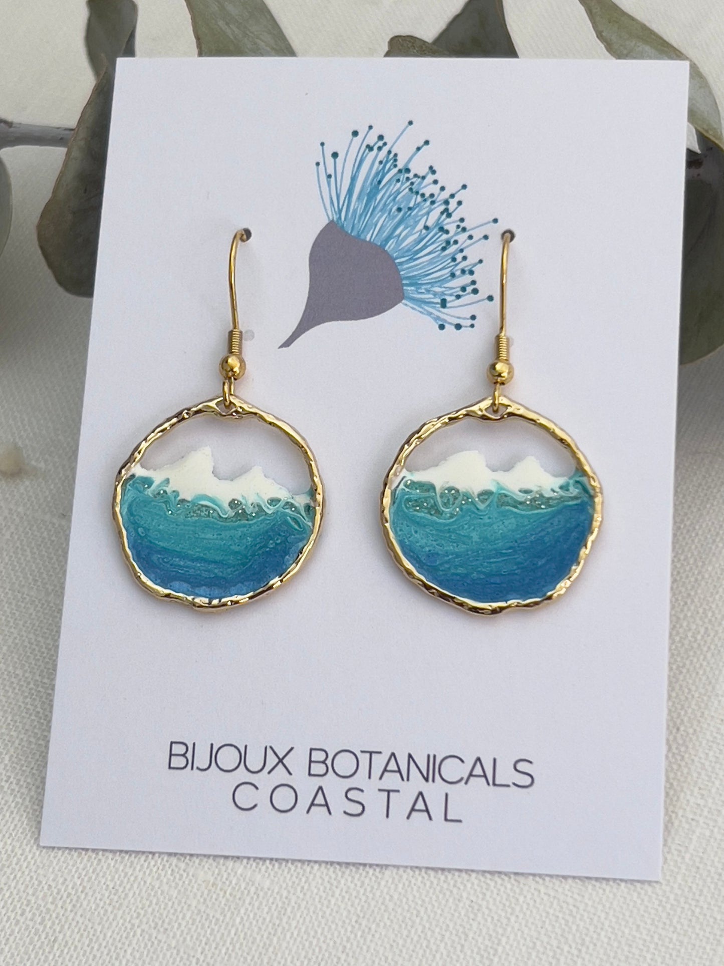 Round gold ocean wave earrings