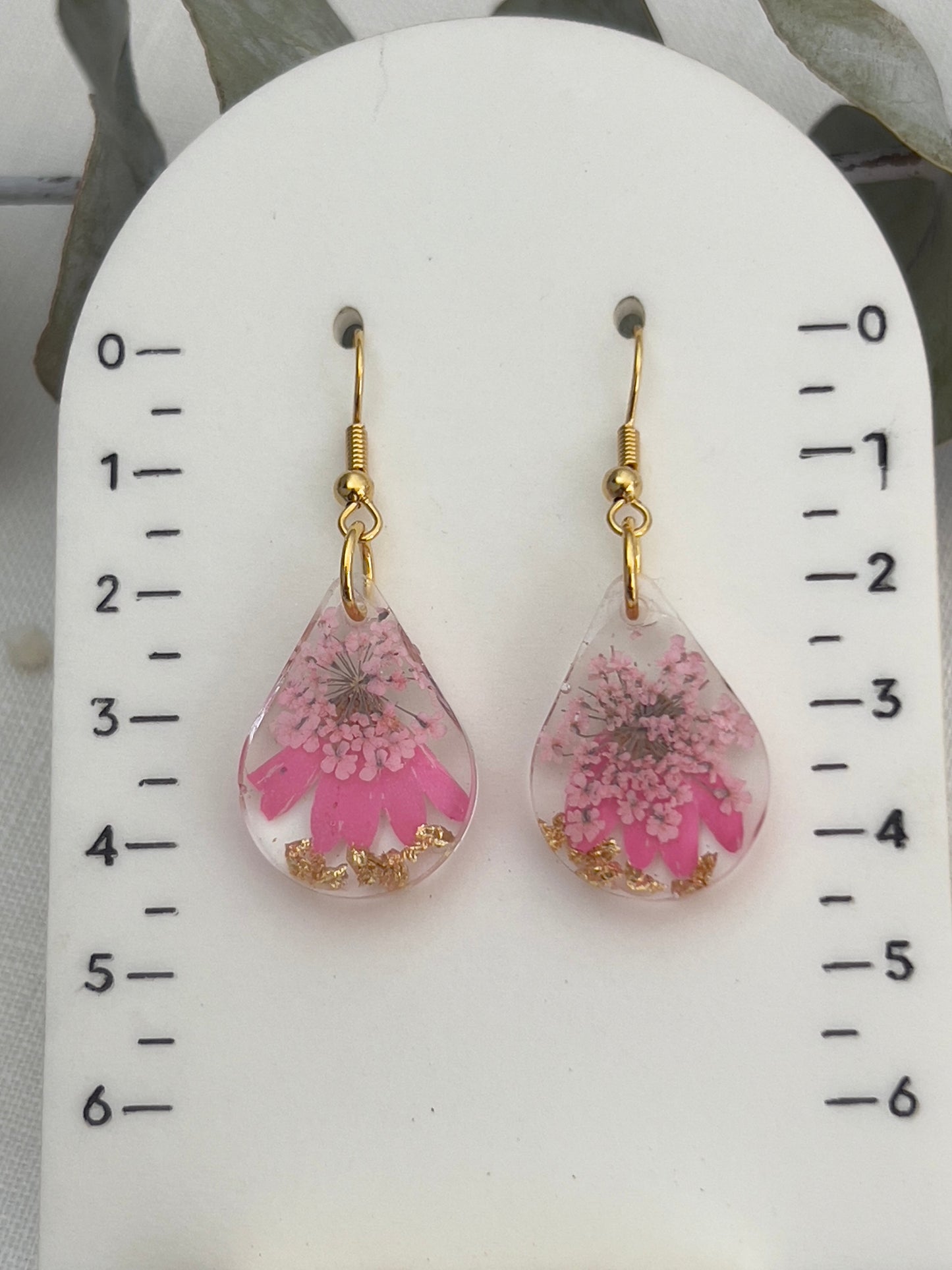 Pink floral round earrings