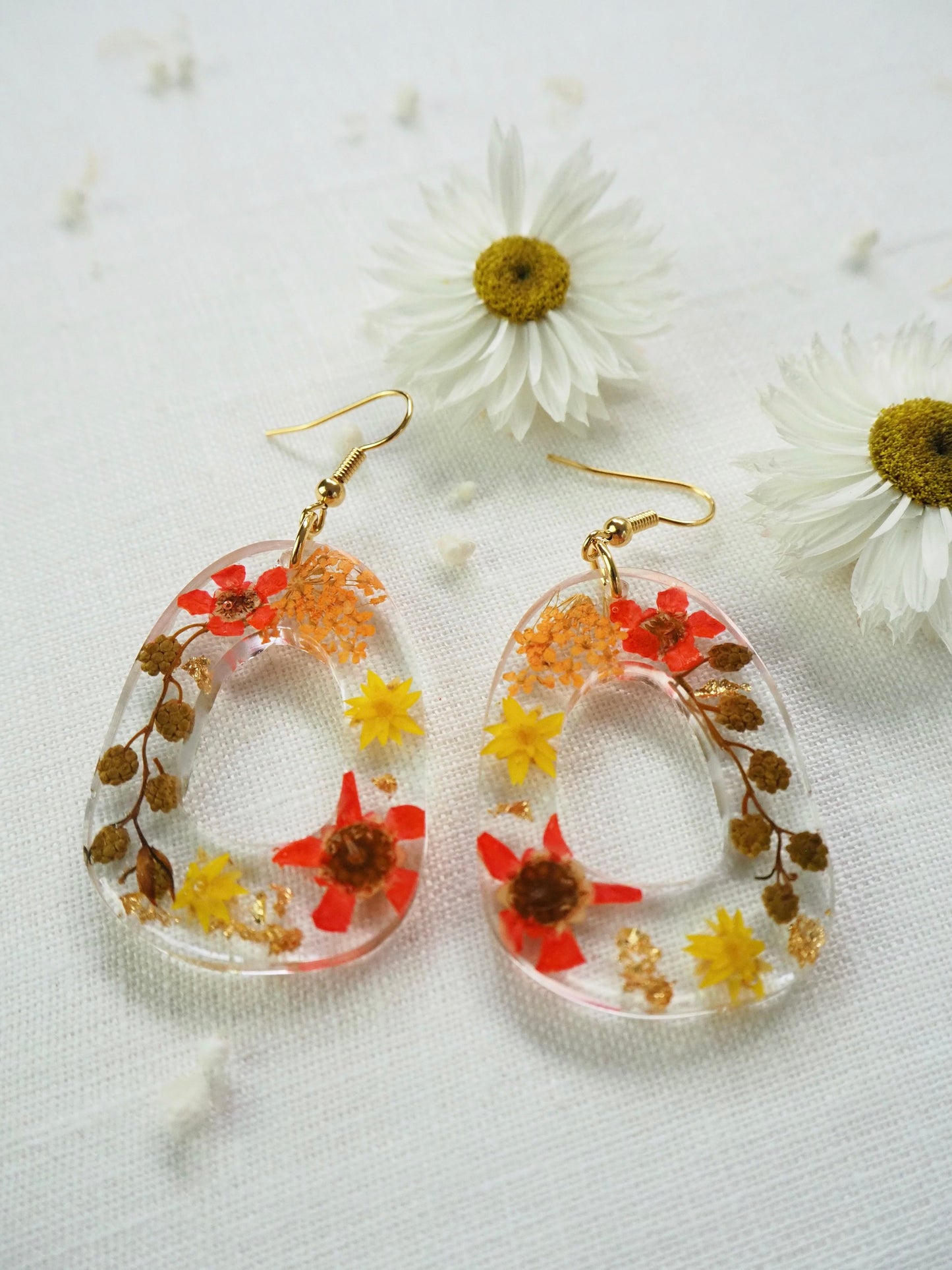 Vibrant orange floral earrings